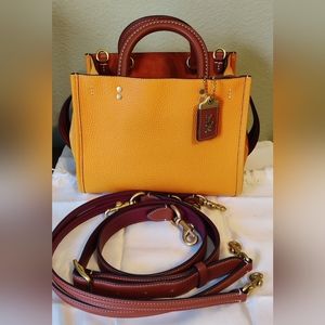 Coach 1941 Rogue 25 in Papaya color block leather